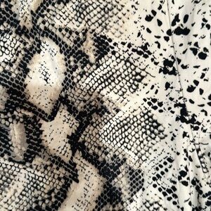 Stretchy snakeskin bellbottoms